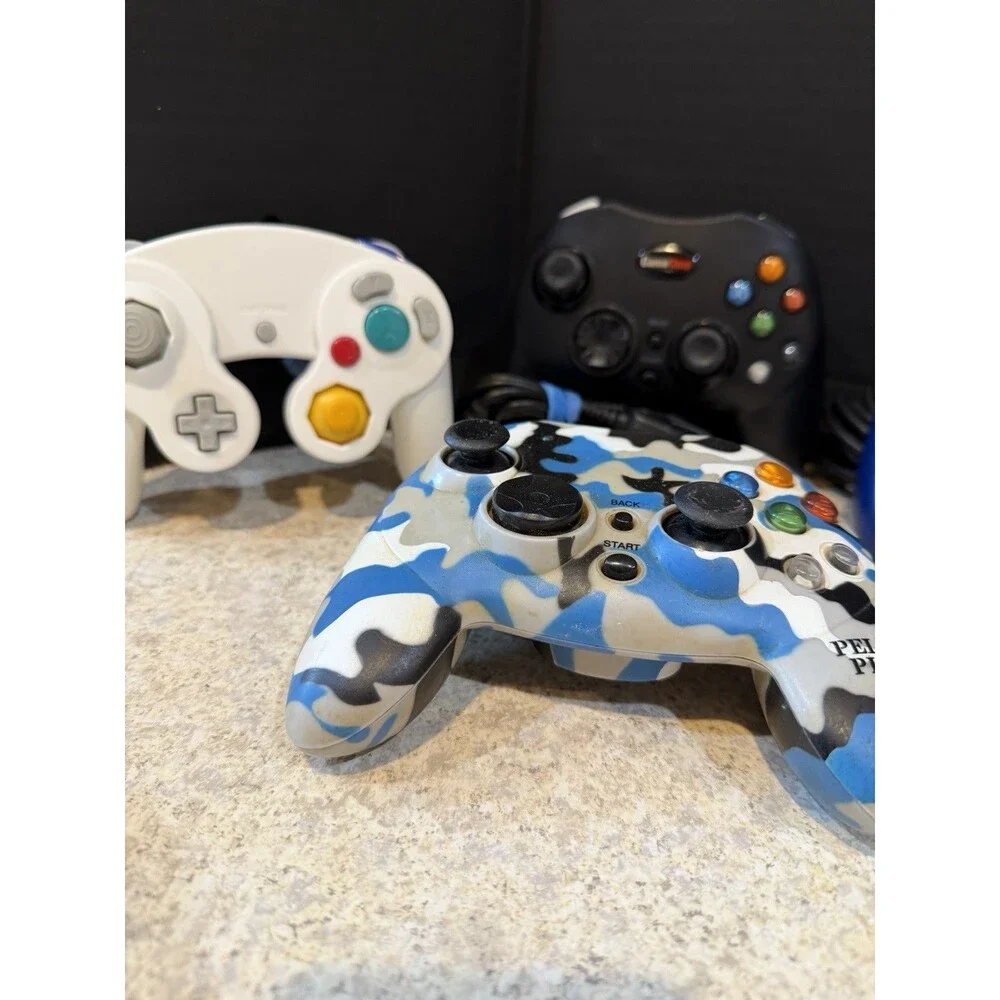 Lot of 7 Mixed Video Game Controllers GameCube Xbox PS Untested Pelican GameStop